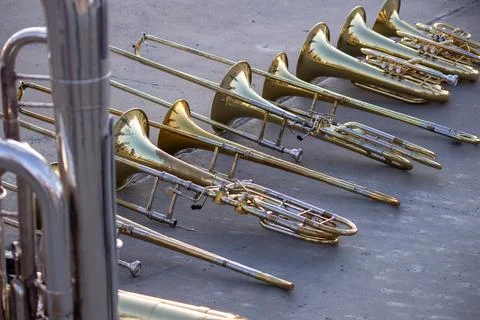 Stack of Trombones, Baritones, Mellophone, and Tuba Fotos de archivo