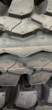 Stack of truck tires with worm pattern Stock-Fotos