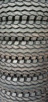 Stack of truck tires with worm pattern Foto stock