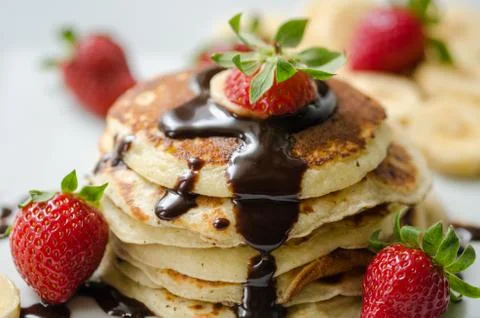 Stack of Turkish -style pancakes with Strawberry and chocolate Stock Photos