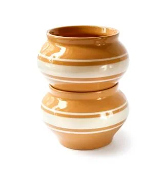 Stack of two ceramic pots for cooking on a white background with clipping path Stock Photos