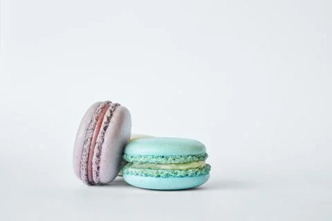 Stack of two colorful French Macarons, macaroons cakes with different flavors 写真素材