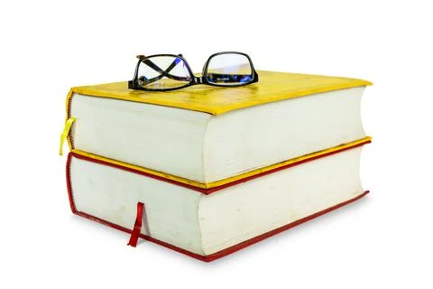Stack of two old books with eyeglasses isolated on white, Object backgrounds イラスト素材