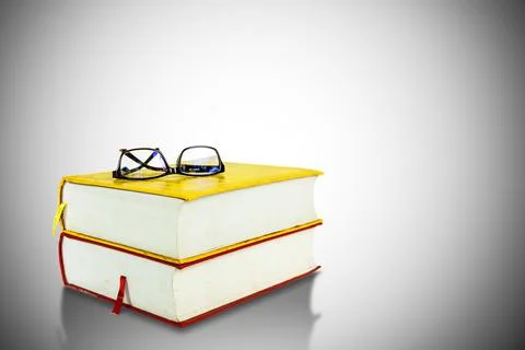 Stack of two old books with eyeglasses isolated on white, Object backgrounds イラスト素材