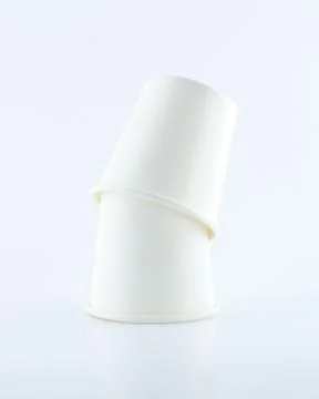 Stack of Two paper cups upside-down on white background Foto stock