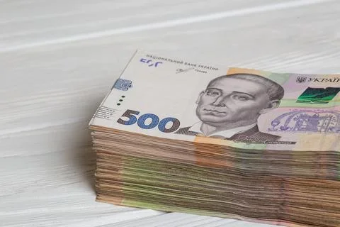 Stack of ukrainian hryvnia banknotes on table Stock Photos