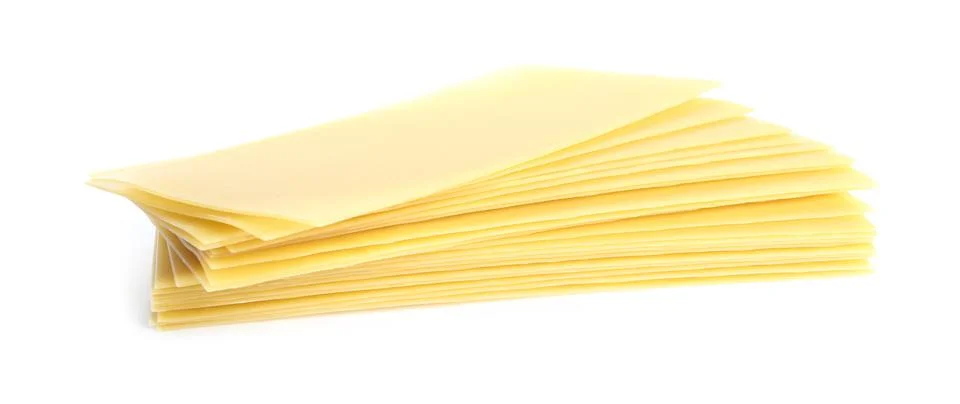 Stack of uncooked lasagna sheets isolated on white Stock Photos