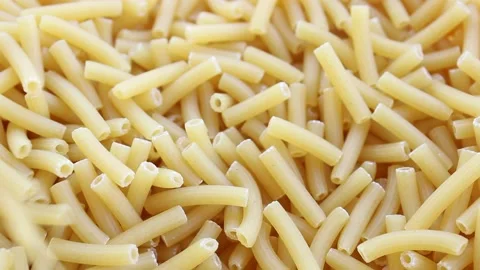Stack of uncooked pasta, close up view of raw food Stock Footage 160095532