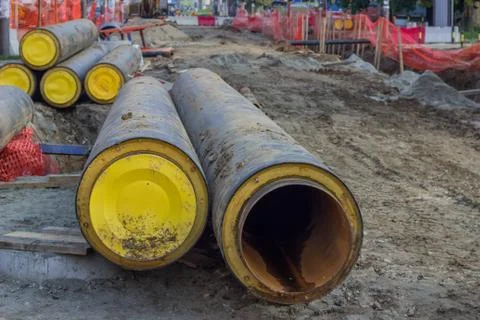 Stack of underground insulated pipes for heat system Stock Photos