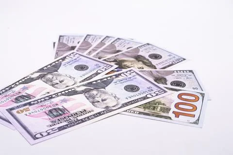 Stack of United States One Hundred Dollar Bills on White Background, Curren.. Stock Photos