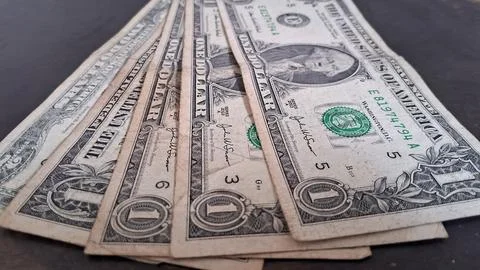 Stack of US dollar bills representing financial success. Close-up of cash for Stock Photos