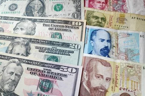 Stack of US Dollars and Bulgarian Lev Stock Photos