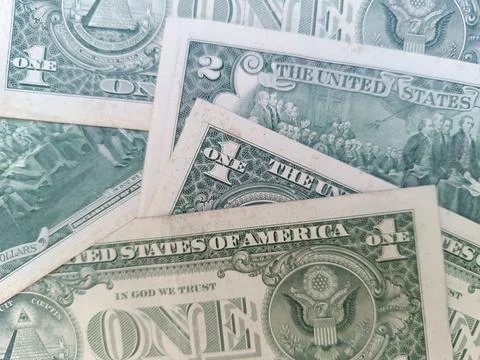 Stack of US One and Two dollar bills. US banknotes. Top view. Business concept. Stock Photos