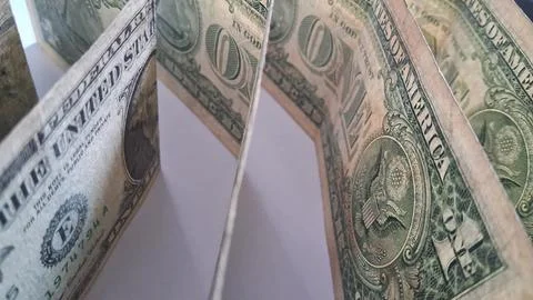 Stack of US one dollar bills on white background. Financial concept for banking Stock Photos