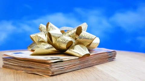 Stack of usa dollars and bow, money gift concept, rotation Stock Footage 153890736