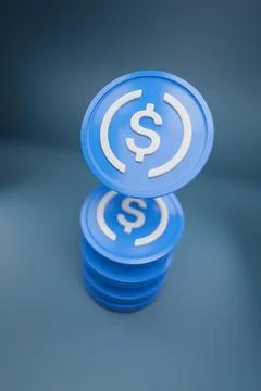 Stack of USDC coin on blue background. 3d illustration. 库存照片