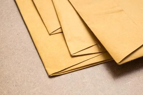 Stack of used brown envelopes Stock Photos