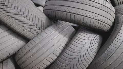 Stack of used car tires waiting to be re.. Video stock 284152891