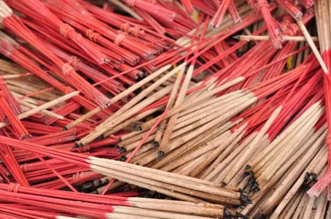 Stack used joss-sticks in temple Stock Photos