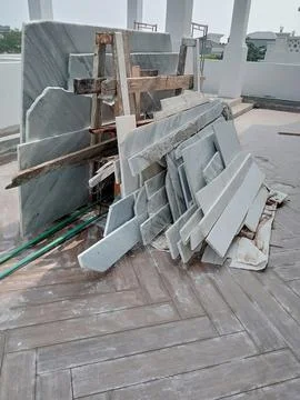 Stack of Used Marble Slabs for Reuse or Construction 스톡 사진