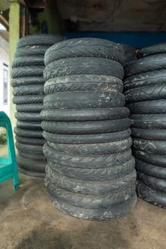 Stack of used motorcycle tires piled up Stock Photos
