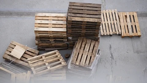 Stack of used pallets Stock Footage 88408955