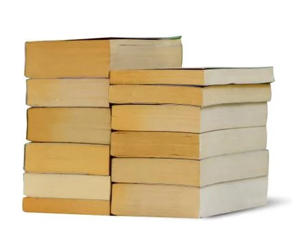 Stack of used pocket books isolated on white, clipping path. Stock Photos