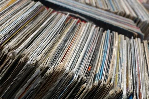 Stack of used vinyl records in covers put on sale Stock Photos