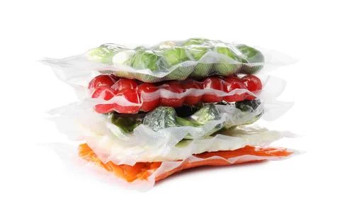 Stack of vacuum packs with different food products on white background 스톡 사진