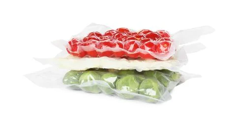 Stack of vacuum packs with different food products on white background 스톡 사진