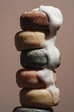 Stack of various craft soap covered in foam Stock Photos