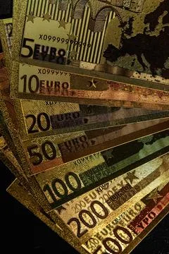 Stack of Various Euro Banknotes Arranged on a Black Background Stock Photos