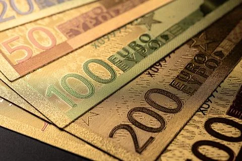 Stack of Various Euro Banknotes Arranged on a Black Background Stock Photos