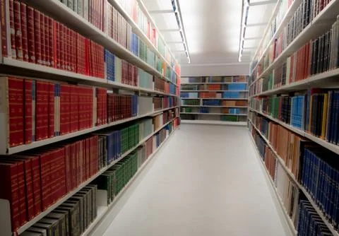 Stack of various information Books for study on a University library bookshel Stock Photos