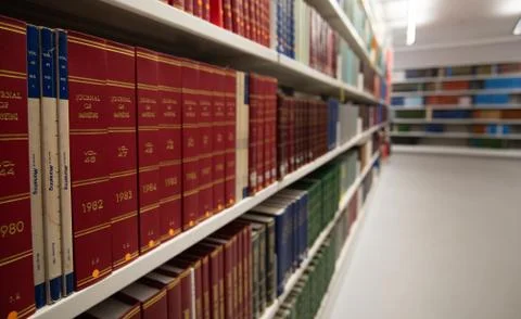Stack of various information Books for study on a University library bookshel Stock Photos