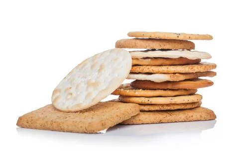 Stack of various organic crispy wheat, rye and corn flatbread crackers Stock Photos