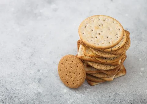 Stack of various organic crispy wheat, rye and corn flatbread crackers Stock Photos