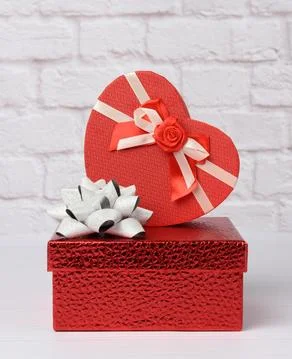 Stack of various red boxes with gifts on white background 스톡 사진