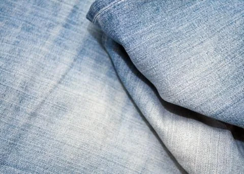 Stack of various shades of blue jeans as background Stock Photos