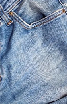 Stack of various shades of blue jeans as background Stock Photos