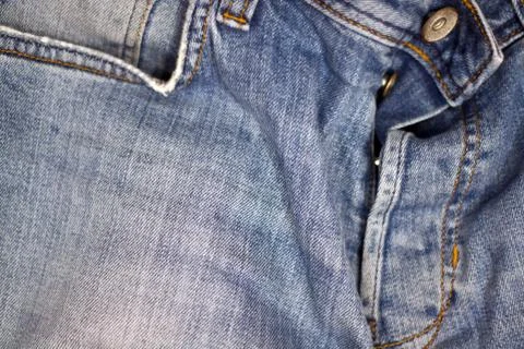 Stack of various shades of blue jeans as background Stock Photos