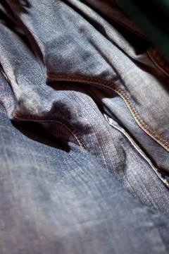 Stack of various shades of blue jeans as background Stock Photos