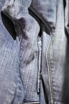 Stack of various shades of blue jeans as background Stock Photos