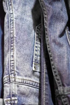 Stack of various shades of blue jeans as background Stock Photos