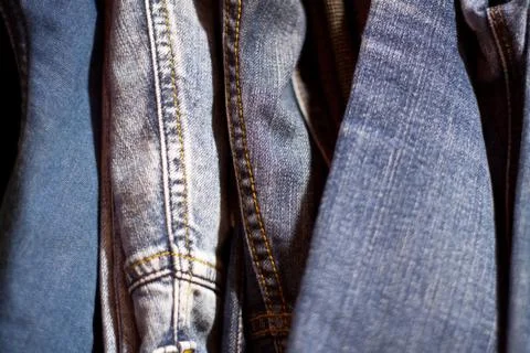 Stack of various shades of blue jeans as background Stock Photos