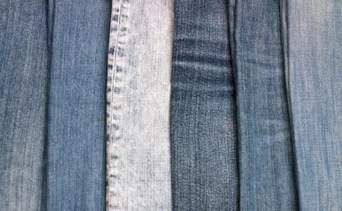 Stack of various shades of blue jeans as background Stock Photos