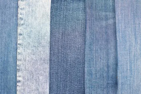 Stack of various shades of blue jeans as background Stock Photos