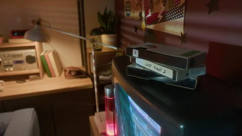 Stack of Vhs Tapes on Big Tv in 90s Room Stock Footage 304854267
