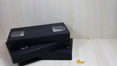 Stack of VHS video tape cassette and potato chips Stock Footage 69863669