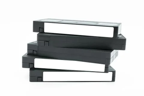 Stack of VHS video tape cassette isolated on white background. Stock Photos